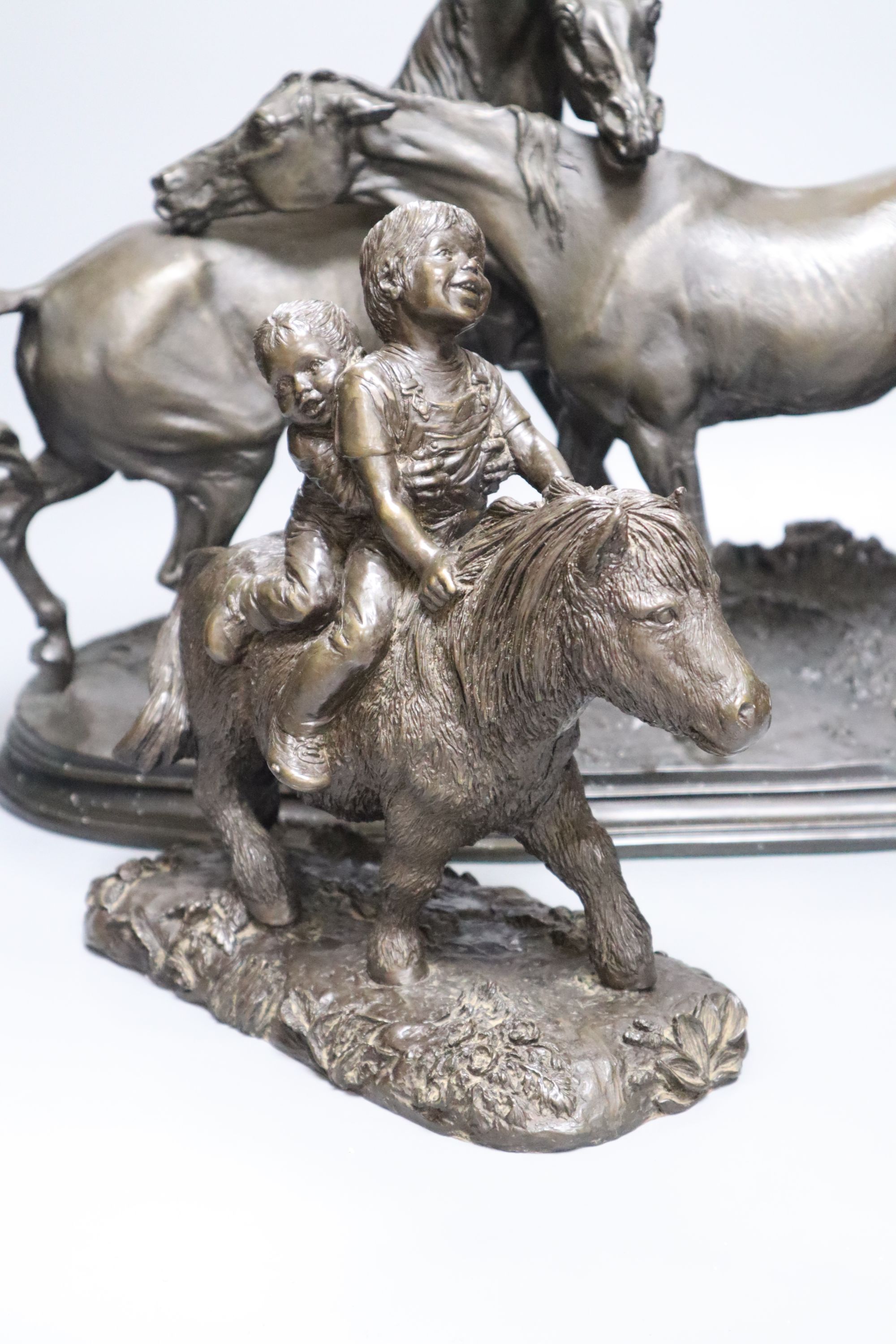 After P. J. Mene, a bronzed resin group, LAccolade and another resin group